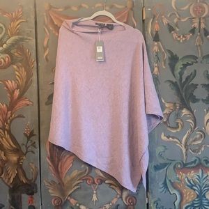 Lavender poncho made of lightweight crepe wool.